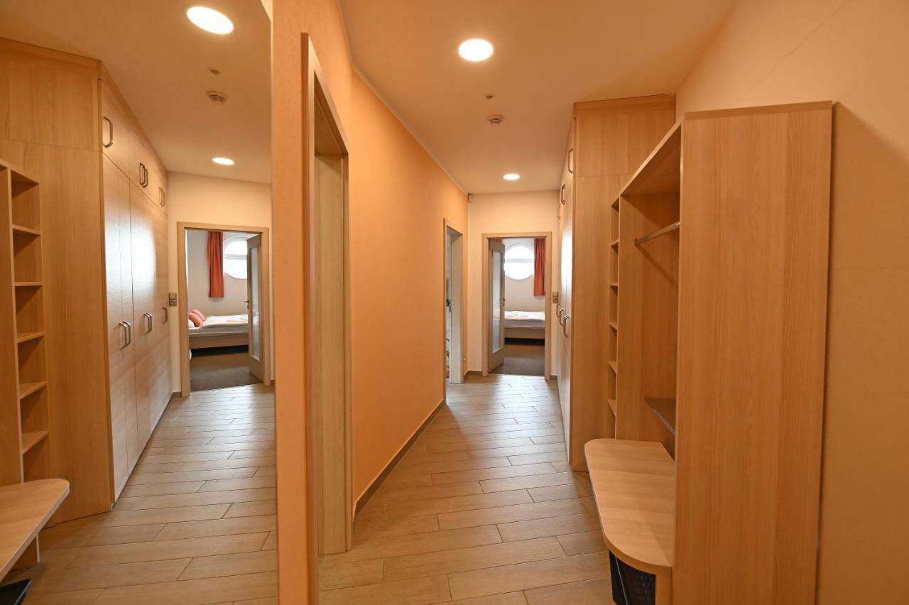 Apartmán s terasou ve vedlejší budově