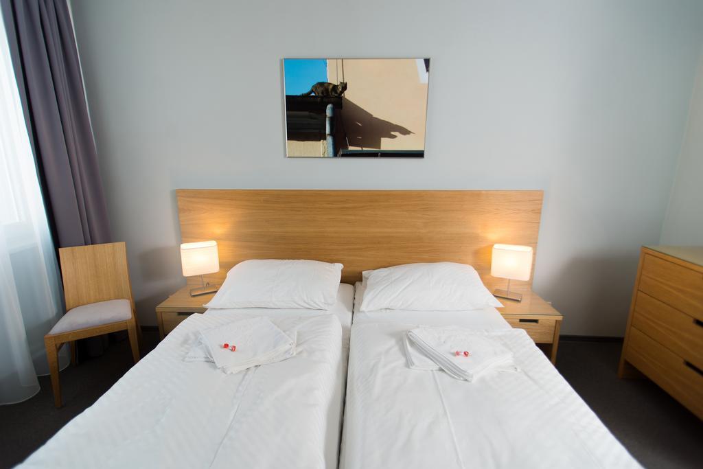 Dvoulůžkový pokoj Comfort s manželskou postelí