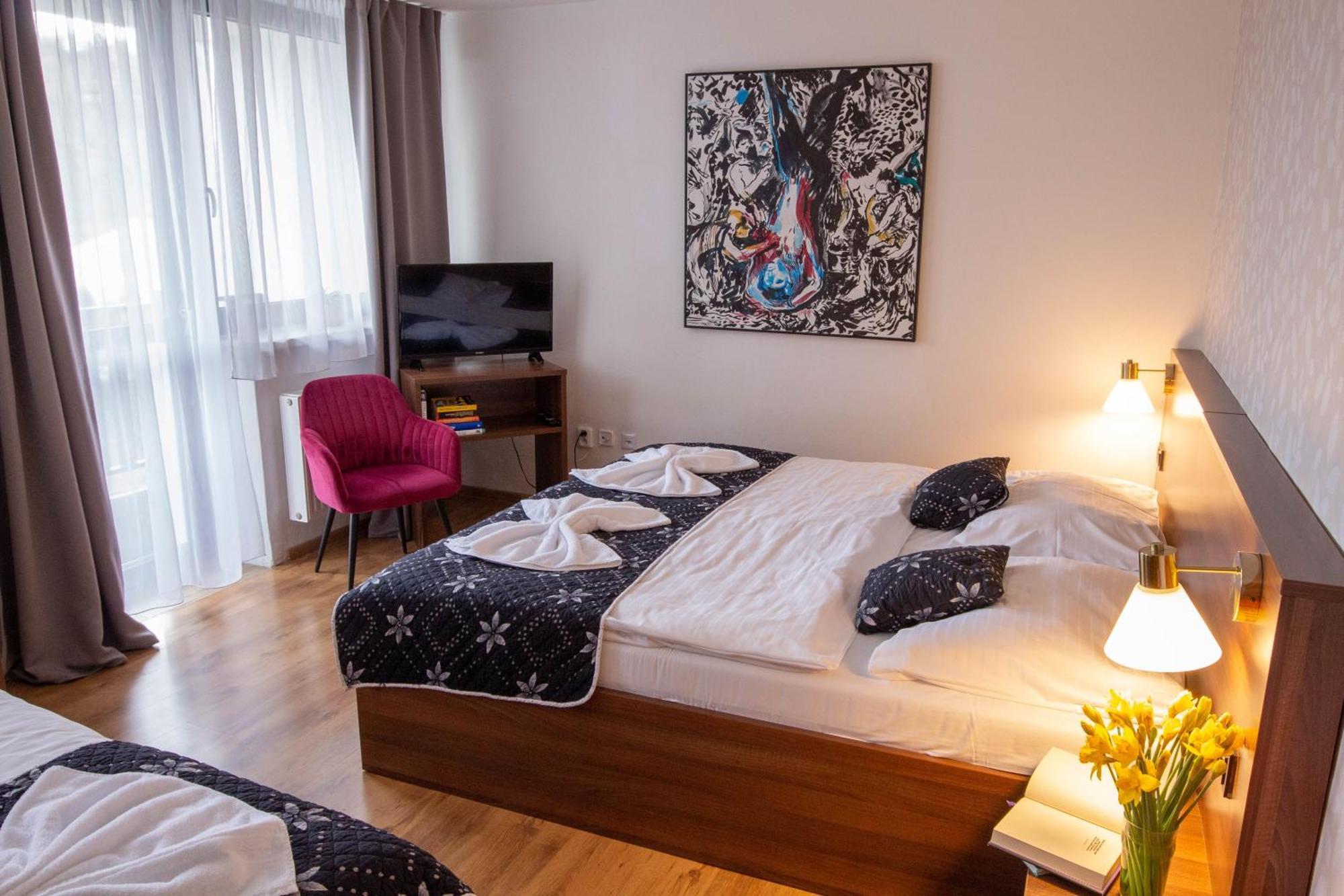 Třílůžkový pokoj s balkonem