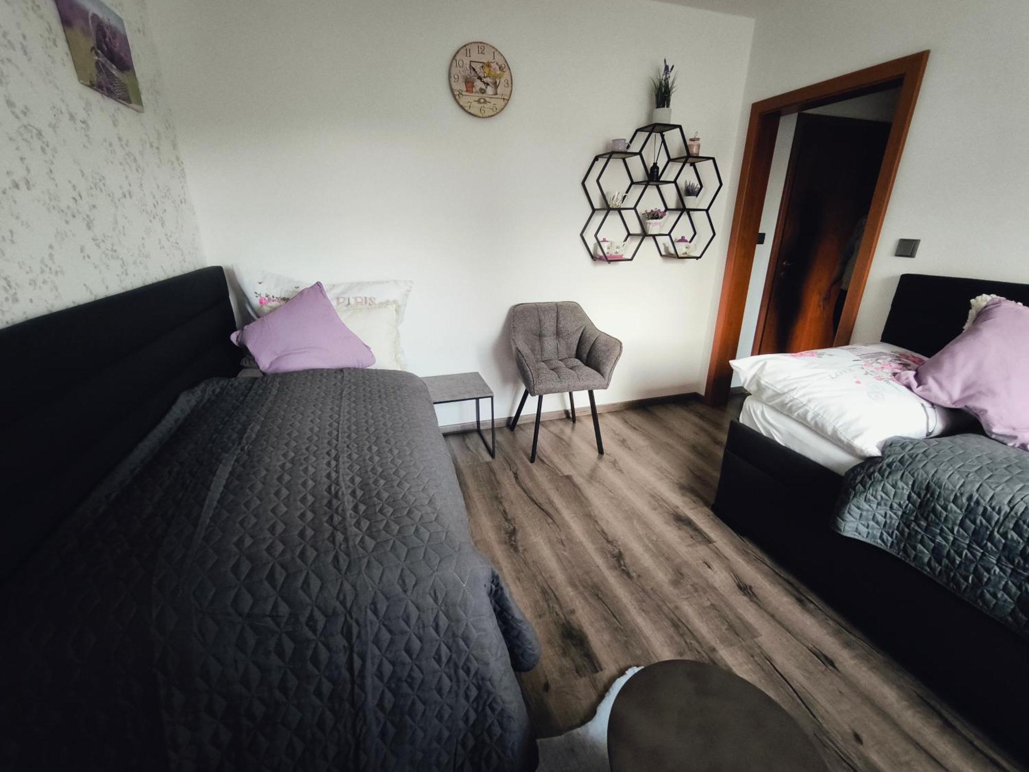Dvoulůžkový pokoj Deluxe s oddělenými postelemi