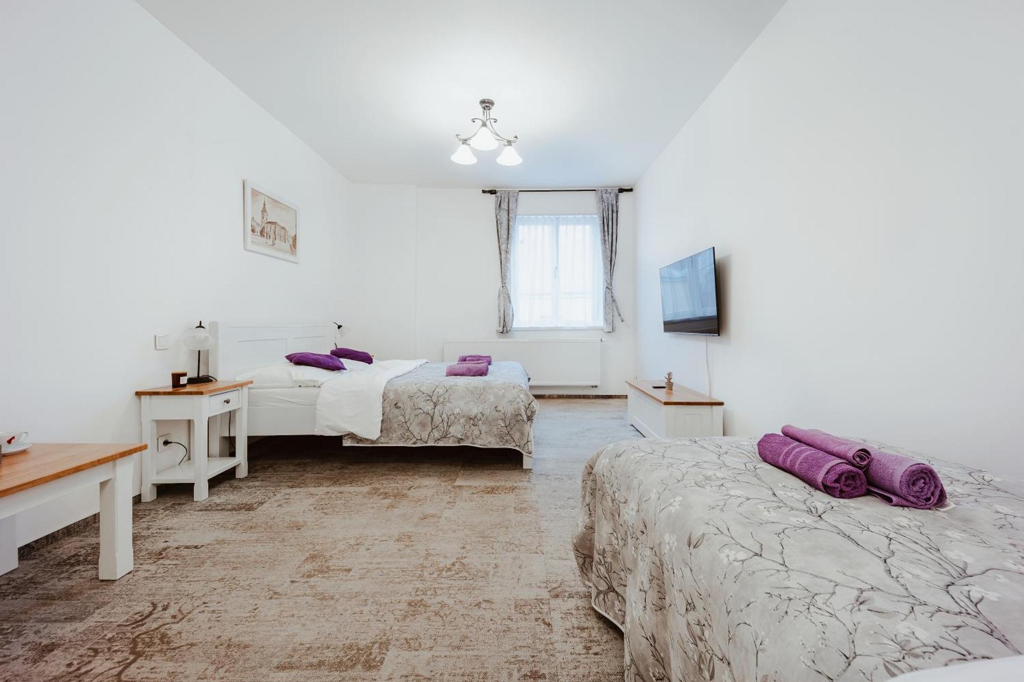 Třílůžkový pokoj Deluxe