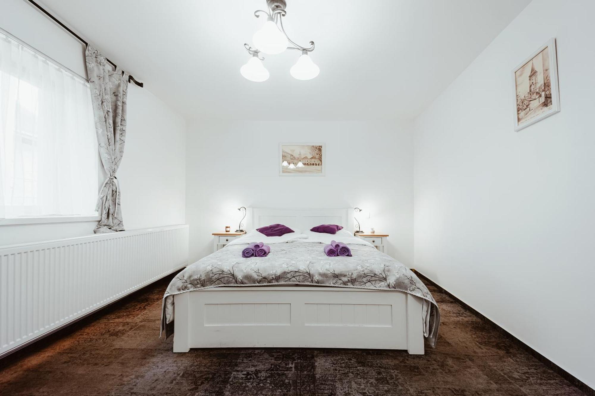 Dvoulůžkový pokoj Deluxe s manželskou postelí