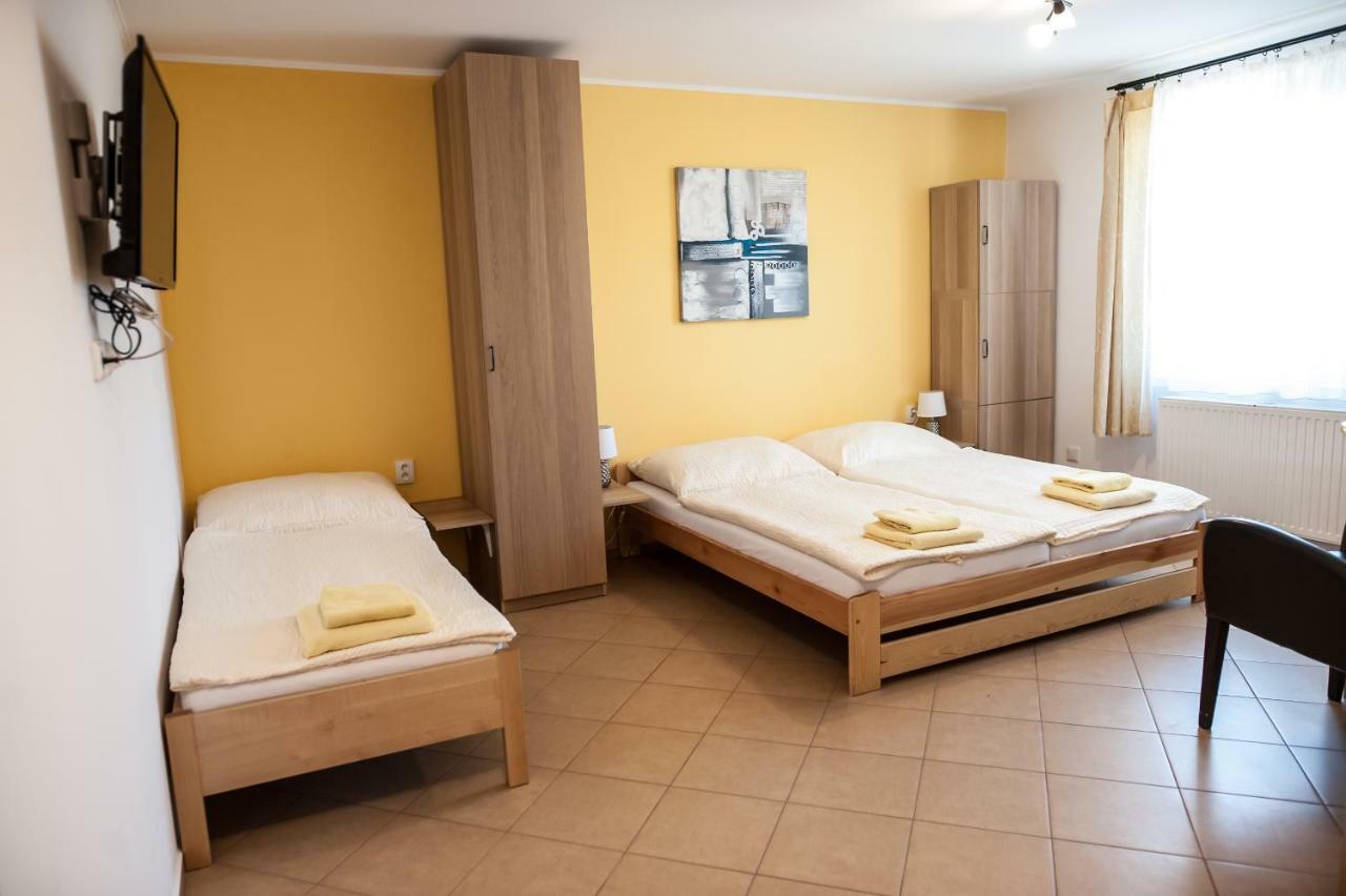 Třílůžkový pokoj